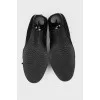 Black buckle front shoes