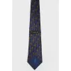 Dark blue yellow print tie