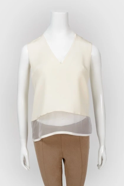 Blouse with a transparent insert