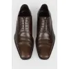 Brown leather lace-up shoes