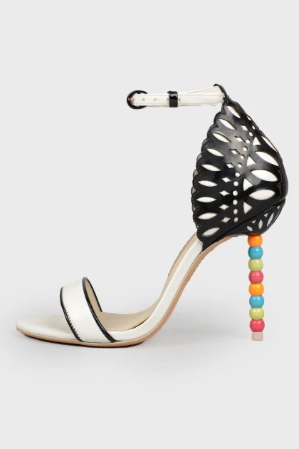Fools with a colored heel and an openwork heel with a tag