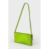 Green neon clutch with tag