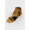 Suede brown sandals with a tag