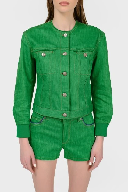 Green denim jacket with tag