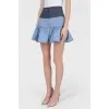 Denim skirt with a stake with tag