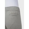 Trousers with elastic and drawstring