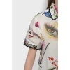 Blouse in an abstract print with a tag