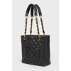 Black quilted bag