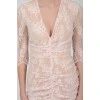 Lace dress in powder color with tag