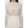 Paul dress with a translucent top with a tag