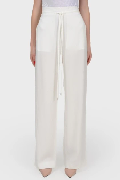 High waist trousers with a backbone with a tag