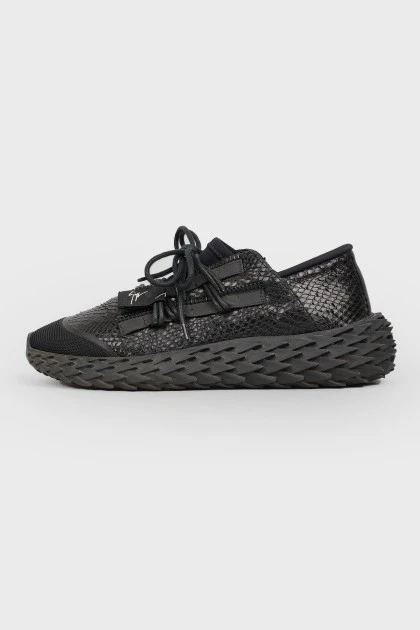 Men\\\'s sneakers under the skin of a reptile