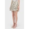 Skirt-Schorts in an abstract print with a tag