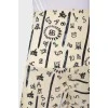 Skirt-Schorts in an abstract print with a tag