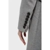 Gray wool coat with asymmetrical buttons