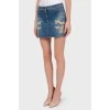 Denim mini-skirt with lace application
