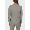 Gray fitted woolen suit in a cage