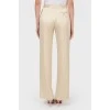 Beige trousers with flared trousers