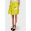 Yellow skirt with floral appliqué