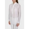 Blouse shirt with a fastener
