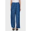 Wide trousers in white polka dots