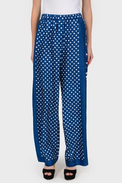 Wide trousers in white polka dots