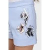 Light blue shorts with beaded appliqué