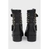 Leather boots with metal spikes