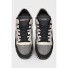 Sneakers with suede inserts and faux scuffs