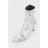 Ankle boots with botanical print and stiletto heels