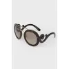 Sunglasses with curly arches