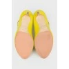 Yellow shoes with an open toe