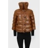 Quilted down jacket with knitted cuffs