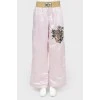 Wide trousers with embroidery