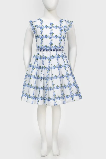 White dress in a blue floral pattern