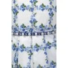 White dress in a blue floral pattern