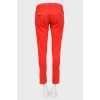 Low waist trousers with decorative zips