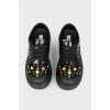 Black sneakers for children with golden beads with tag