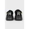 Black sneakers for children with golden beads with tag