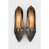 Leather pumps with brown snake insert