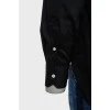 Men's black shirt with white buttons