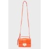 Bag with belt in coral color