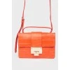 Bag with belt in coral color