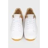 Golden heel sneakers