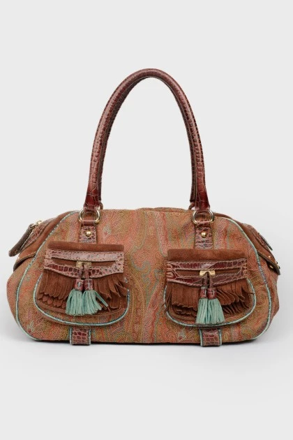 Bag with pockets and fringe