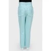Turquoise embroidered jeans