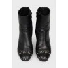 Black leather boots with metal studs