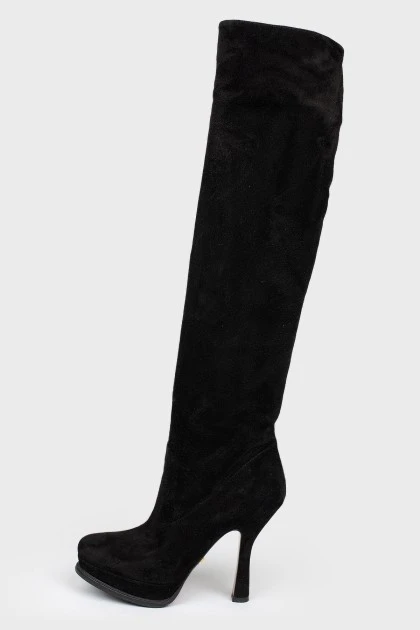 Black suede boots with stiletto heels