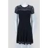 Black dress with perforated inserts