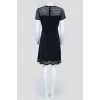 Black dress with perforated inserts